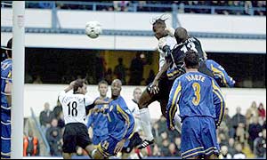 Martin Djetou heads Fulham ahead against Leeds