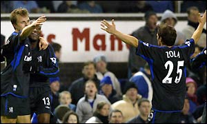 Jesper Gronkjaer celebrates scoring Chelsea's third goal with William Gallas and Gianfranco Zola 