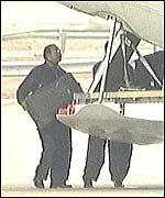 Loading the dossier onto the UN plane