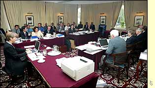 Lawyers and officials gather for the rules hearing