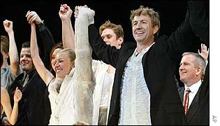 Baz Luhrmann (right foreground) with members of his La Boheme cast and crew