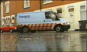 Transco van in waterlogged street