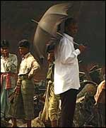 Shipbreaking yard boss (with umbrella) in Chittagong