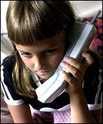 Girl using telephone