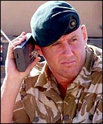 A British soldier in Oman listens to the World Service