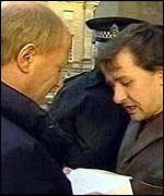 Health Minister Malcolm Chisholm (left) in discussion with Hepatitis C sufferer Andrew Gunn