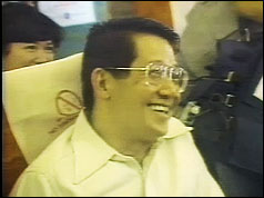 Benigno Aquino on flight back to Philippines