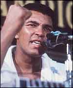 Muhammad Ali clenches his fist