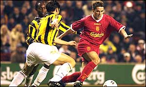 Michael Owen runs at the Vitesse defence