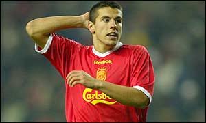 Milan Baros shakes his head after missing a goal-scoring chance 