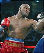 Evander Holyfield in action against Hasin Rahman in June