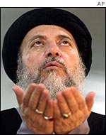 Mohammed Baqir al-Hakim (r) of Sciri