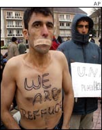 Asylum seeker protests in a park in Calais