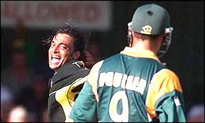 Pakistan bowler Shoaib Akhtar celebrates after dismissing South African batsman Mark Boucher