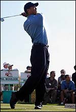 Woods had been bothered by his inflamed knee