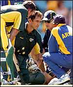 Justin Langer receives treatment