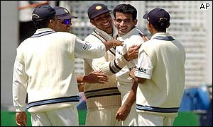 Zaheer Kahn is congratulated by his team mates