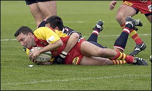 Pascal Giordani the Perpignan centre scores a try against Gloucester