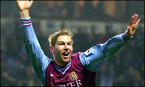 Tomas Hitzlsperger accepts the applause of the Villa fans for his injury-time winner