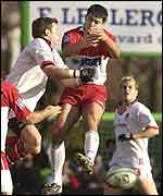 Ulster's Bryn Cunningham goes up for a high ball with Guillaumo Bousses