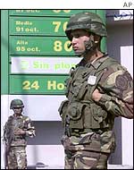 A Venezuelan guard at a petrol station