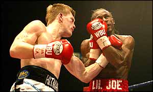 Ricky Hatton pounds his opponent