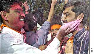 BJP supporters paint themselves