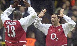 Sol Campbell and Robert Pires celebrate the equaliser