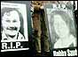placards of some of the strikers that died