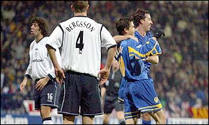 Leeds United's Robbie Fowler is congratulated by Harry Kewell after scoring the second goal against Bolton Wanderers
