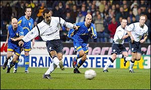Bolton's Youri Djorkaeff takes a 24th-minute penalty but misses