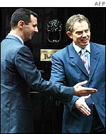 Syrian President Bashar al-Assad (left) and UK Prime Minister Tony Blair