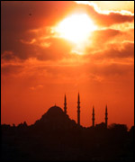 The sun sets over the Suleymaniye mosque in Istanbul