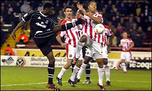Sheffield United's Carl Asaba (right) scores against Crystal Palace