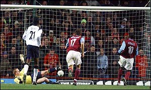 Darius Vassell puts Villa 1-0 up when he scores from the penalty spot