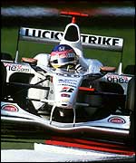 Jacques Villeneuve wrestles with his BAR at the Italian Grand Prix