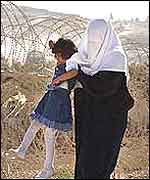 Palestinian woman with child