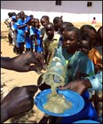 Children in Zimbabwe receive food aid