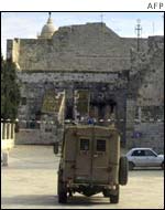 An Israeli jeep patrols the streets of Bethlehem