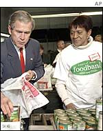 President Bush volunteers at a Washington food bank