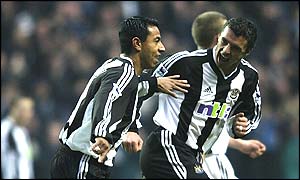 Newcastle's Gary Speed congratulates goalscorer Nolberto Solano