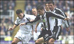 Fulham's Steed Malbranque and Newcastle's Aaron Hughes