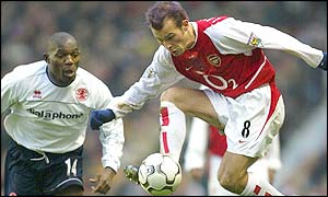 Freddie Ljungberg controls the ball for Arsenal