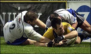 Kenny Logan is foiled on the Bath try-line by some good defence