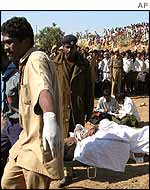 The injured are carried away on stretchers