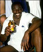 Gladstone Small enjoys a celebratory drink