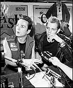 Strummer and Simonon court the press