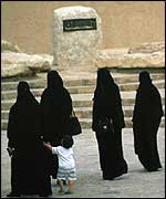 Women in black robes