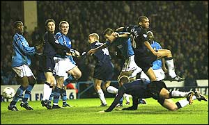 Chris Perry heads in the equaliser for Spurs on 36 minutes to make sure the scorline is level at half-time