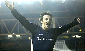 Simon Davies celebrates his goal for Spurs which puts the visitors 2-1 ahead